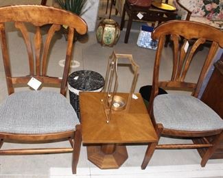 Lots of beautiful chairs and occasional tables.