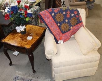 We have lots of throws, quilts, linens, flower arrangements, rugs and so much more.  