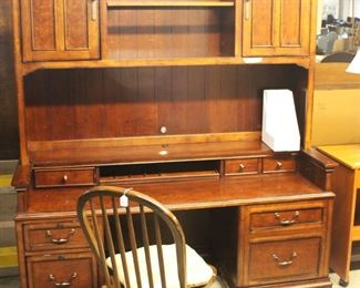 One of the many desks we have for sale.  This desk with hutch is made by "Aspen Home".  The dimensions are 24D x 66W x 80 H.