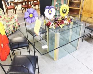 Glass top dining table and six "flower backed" chairs.