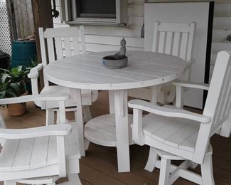 FINCH OUTDOOR TABLE AND SWIVEL CHAIRS