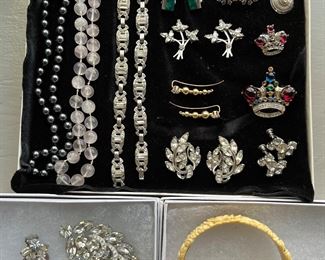 Nice selection of sterling silver and vintage signed costume jewelry.  Scroll down to see additional photos of jewelry near the end of the ad.