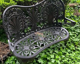 Wrought iron bench.