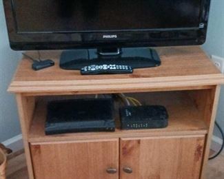 Older flat screen tv and tv stand
