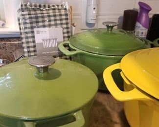 Cast iron dutch ovens, various sizes and colors