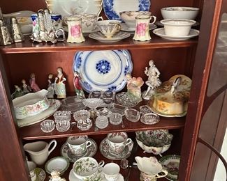 China cabinet full of collectibles