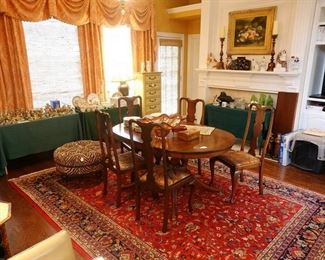 Beautiful dining room set, 9x12 Oriental hand knotted rug, leopard ottoman.
