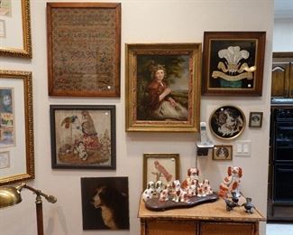 Framed sampler, painting, prints, Staffordshire dogs.