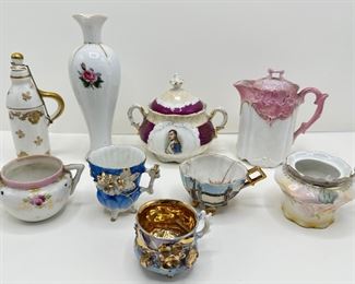 Antique & Vintage Tea Pots, Creamers, Cups & Vase With Gold Accents (9 Pieces)
Lot #: 220