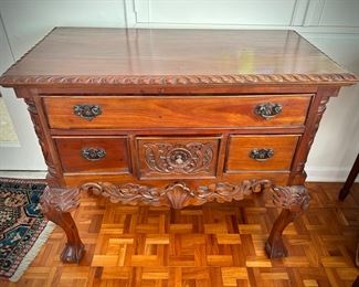 Carved wood chest with four drawers