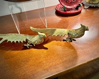 Brass peacocks