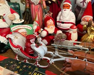 Cast iron Santa in sleigh/reindeer
