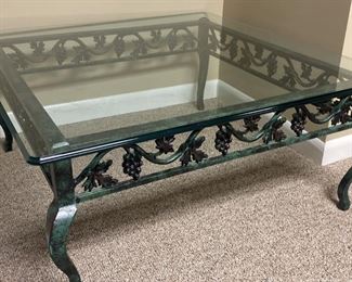 This cocktail coffee table has a huge thick piece of glass that could be used on another base. This would be nice painted another color. Only $45