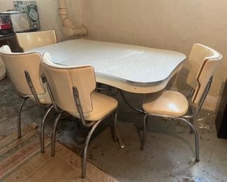 Vintage Formica table with 4 vinyl chairs...