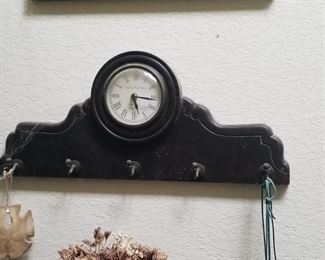 Wall rack with clock, stylish and useful