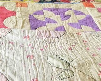 Lots of vintage quilts