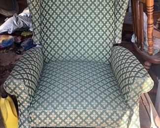 Authentic Walking Dead Show Prop:  This is a green and off-white wing back chair which can be seen in The Walking Dead Season 9 - Episode 2 at Hilltop.  This item comes with a Certificate of Authenticity.  Check out the next picture to see where this chair was located in the show.  Priced at $200.