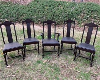 Authentic Walking Dead Show Prop:  This is a set of five dark brown/espresso wooden dining chairs with leather seats used in several episodes of The Walking TV series.  This item comes with a Certificate of Authenticity.  Check out the next picture to see where these chairs  were located in the show.  Priced at $350 for the set.