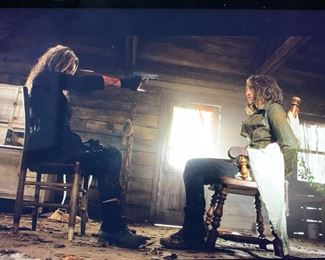 This is a screen shot from The Walking Dead showing where the chair was located in Season 11 - Episode 16. It's the chair on the right where Maggie is tied up.  The bloody blanket that can be seen in this screenshot is still attached to the chair by zip tie.