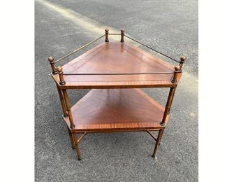 This item is a vintage triangle, two shelf side table. 
This was not labeled with where it was used in the show, and we've not located a screen match of this table yet.  But it does come with a certificate of authenticity signed by an AMC representative authenticating that this is a show prop from The Walking Dead.  Priced at $75.