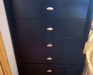 Black chest of five drawers