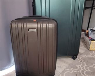 Ricardo and Sharper Image suitcases 360 casters