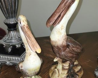 Ceramic pelican figurines