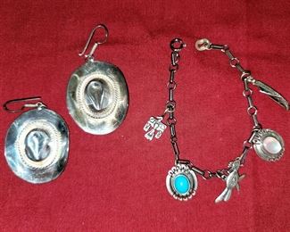 Sterling silver cowboy hat earrings and charm bracelet.