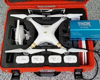 DJI Phantom Professional drone, accessories, storage case, THOR fast charger.