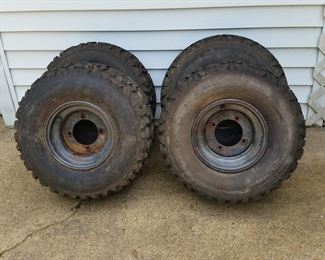 These four wheels fit a Kawasaki 'Mule'.