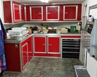The front of the trailer has built-in cabinets and tool chest.