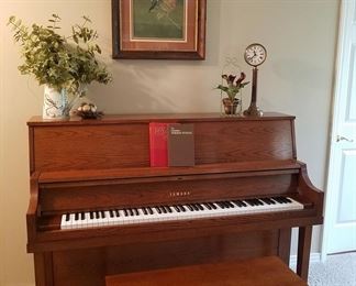 Yamaha upright piano with bench