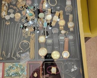 Lots of jewelery and old watches