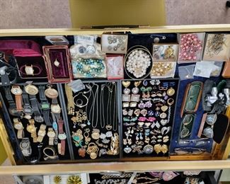 Lots of jewelery and watches