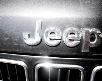 2013 Jeep Grand Cherokee with only 64.6 thousand miles on it with clean inside with excellent black leather upholstery