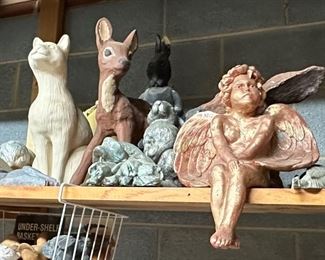 Various yard ornamental figurines; angel dog cat, frog rabbit, etc.