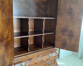 Inside Henredon armoire storage unit