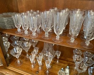 Fostoria glassware:  white and red wine, water, champagne, sherry, aperitif, dessert plates and water pitcher 