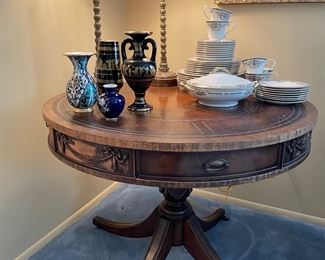Another view of the leather-topped pedestal table 