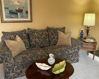 2-cushion couch with back pillows, drop-leaf side table, Vintage serving dishes, blown glass vase, Drexel Heritage side table with bronze lamp