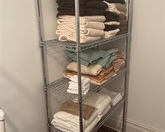 there are three storage racks - various sizes 