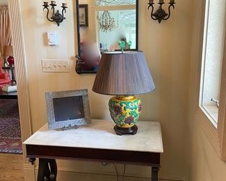 Foyer marble top table; vintage iron framed mirror with pair sconces & Majolica style lamp