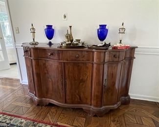Antique style serpentine sideboard