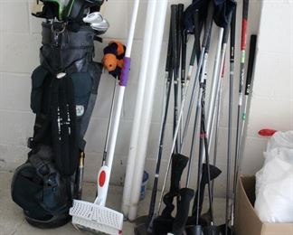 Assorted golf clubs