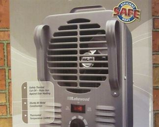 New 1500 watt utility heater in box.