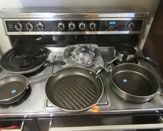 Kitchen frying pans and others.