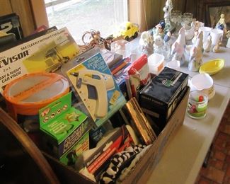 Another table full, come pick threw the boxes items are marked and priced.