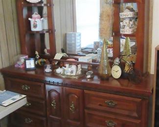 Nice lighted dresser and mirror.