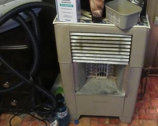 Kenmore natural gas heater.  Still hooked up to gas line.