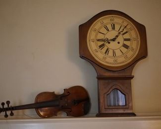 violin, mantel clock